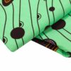 Gqom hollandaise print fabric is green with music patterns